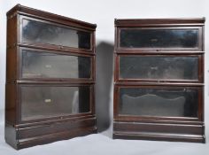 Two early 20th century Globe-Wernicke library stacking book cases, each being a stack of three,