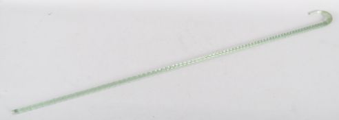 A Victorian glass barley twist walking cane, of tapering form, of pale green tint,