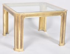 A Continental brass and glass coffee table, mid 20th century, perhaps French, of canted square form,