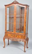 A Georgian revival walnut inlaid display cabinet,