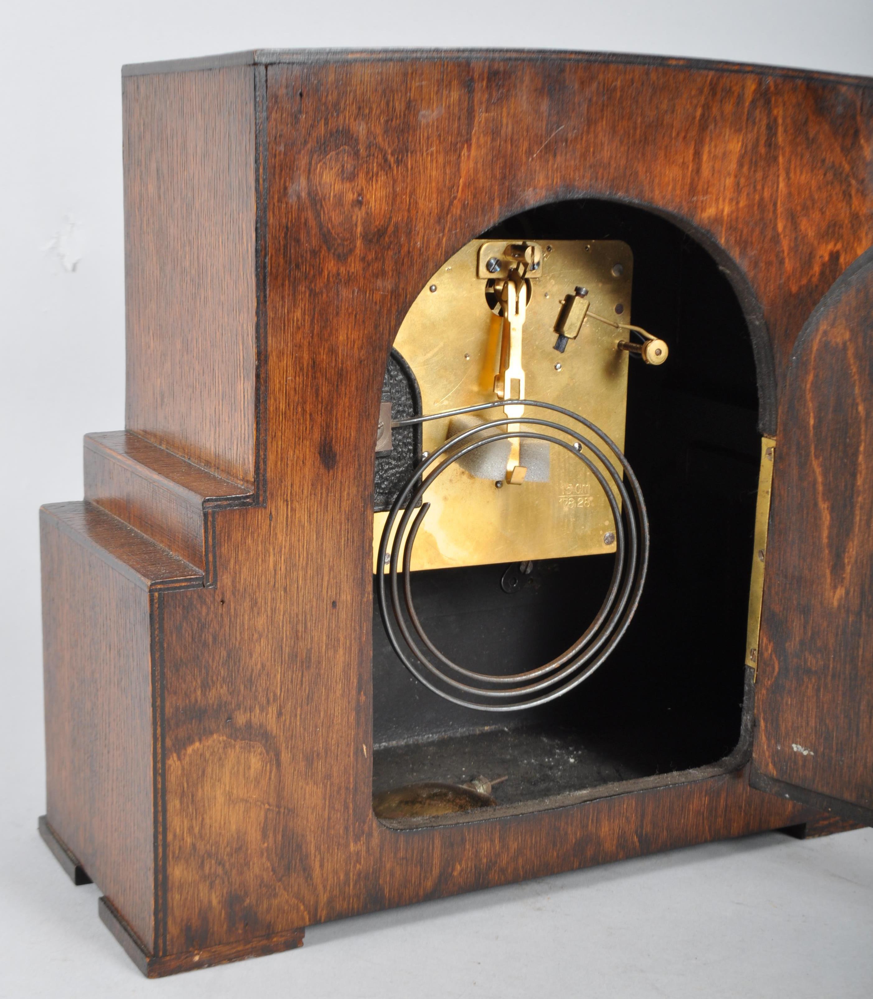 An oak cased Art Deco clock, of rectangular stepped form, striking on a gong, - Image 2 of 2