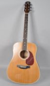 A Lorenzo L-472 acoustic guitar,