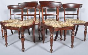 A set of six William IV mahogany dining chairs, each with curved top rail,