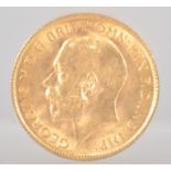 A loose half sovereign coin, dated 1911