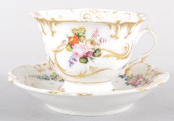 A porcelain cabinet cup and saucer, mid 19th century, of Rocaille form,