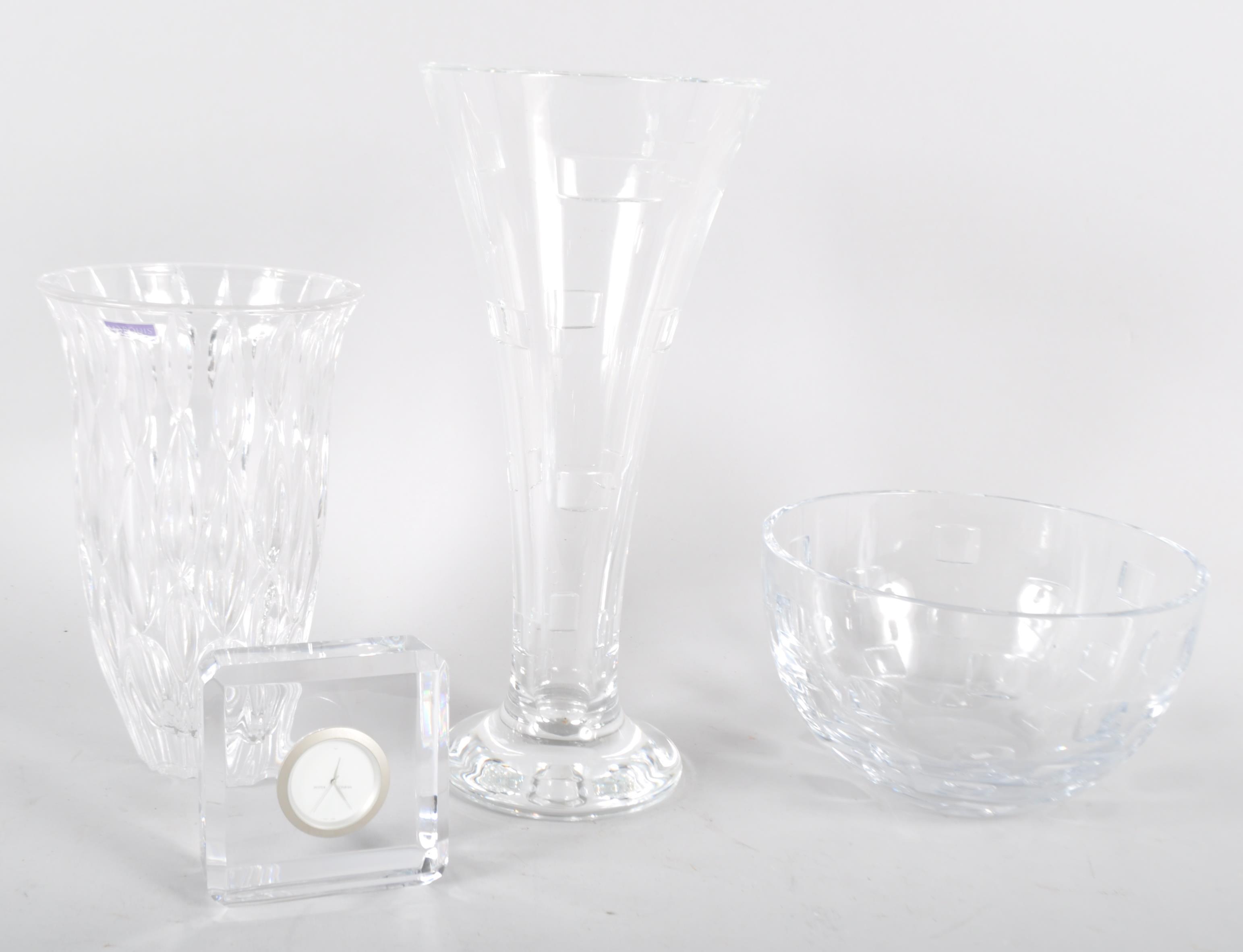 Four pieces of Waterford crystal to include two vases the largest 33cm