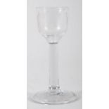 A mid 18th century drinking glass,