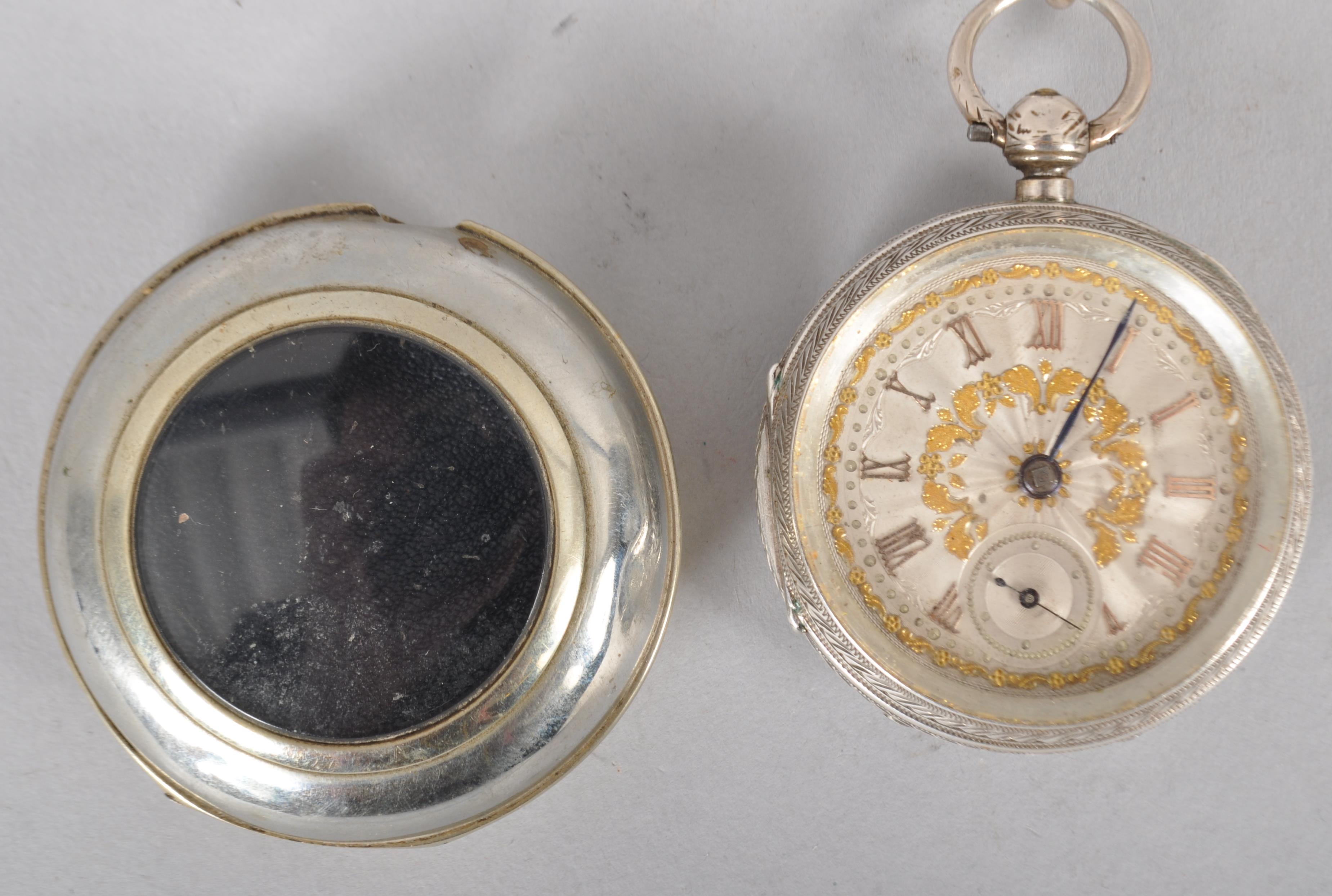 A sterling silver open face key wound pocket watch. - Image 3 of 4