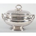 A Victorian silver plated soup tureen, raised on spreading foot with leaf capped twin handles,