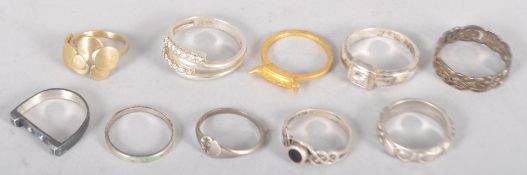 Ten assorted white metal rings, some stamped .925,