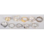 Ten assorted white metal rings, some stamped .925,