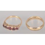 A collection of two rings to include: A 9ct gold half hoop garnet ring;