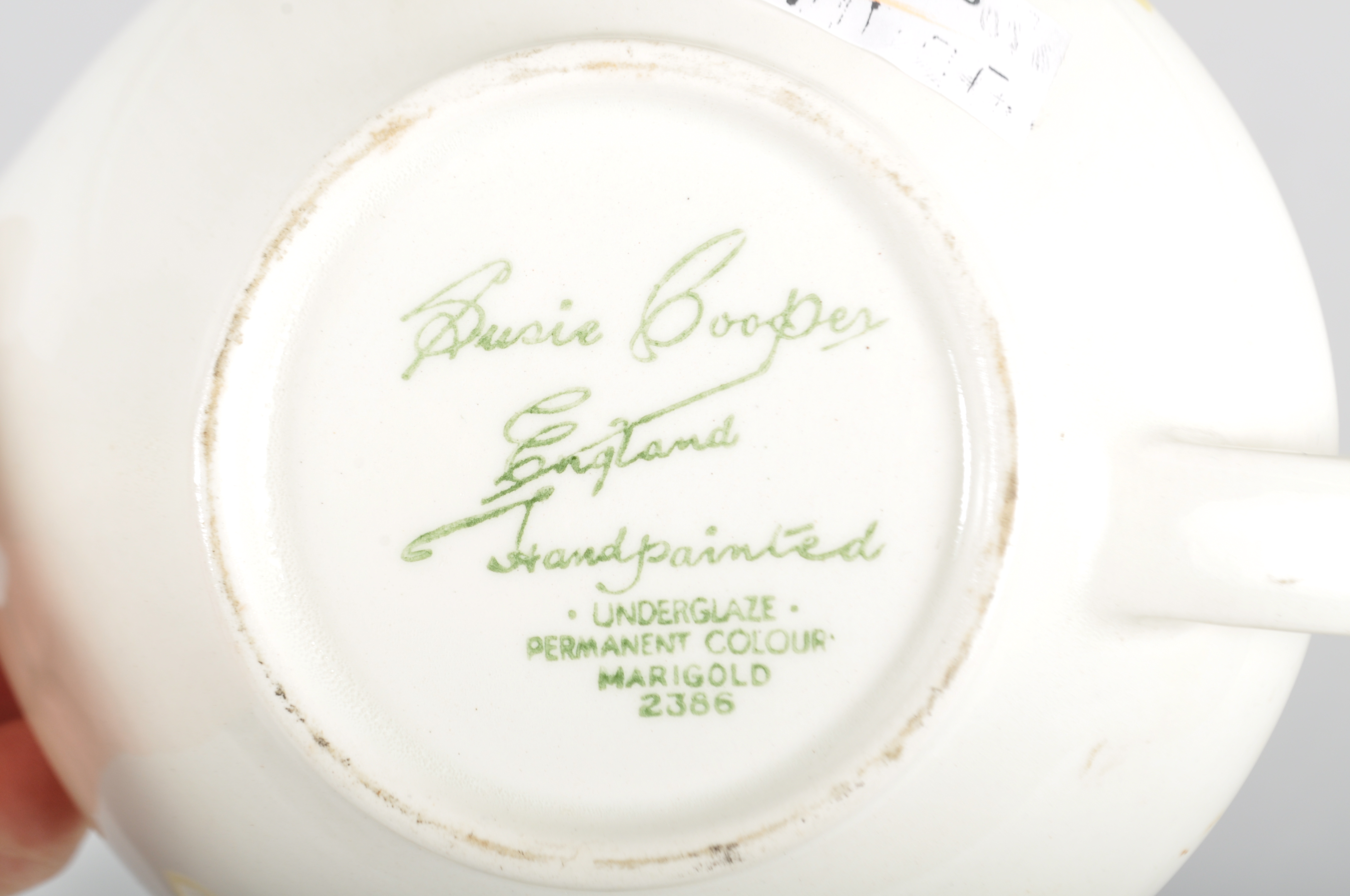 A Susie Cooper 'Marigold' pattern dinner service, circa 1920-30, printed green marks, - Image 3 of 3