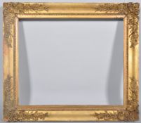 A carved giltwood and gesso picture frame, 19th century, with rocaille border,