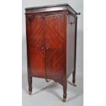 A G M & Co floor standing gramophone, in mahogany case, on square feet,