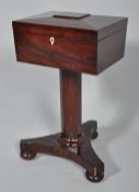 An early Victoria mahogany Teapoy work box, of sarcophagus form, with lined interior,