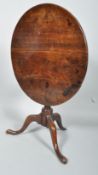 A George III mahogany tilt-top tea table,