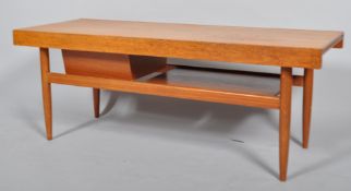 A White & Newton 1960's retro vintage teak wood coffee table/work box with sliding top,