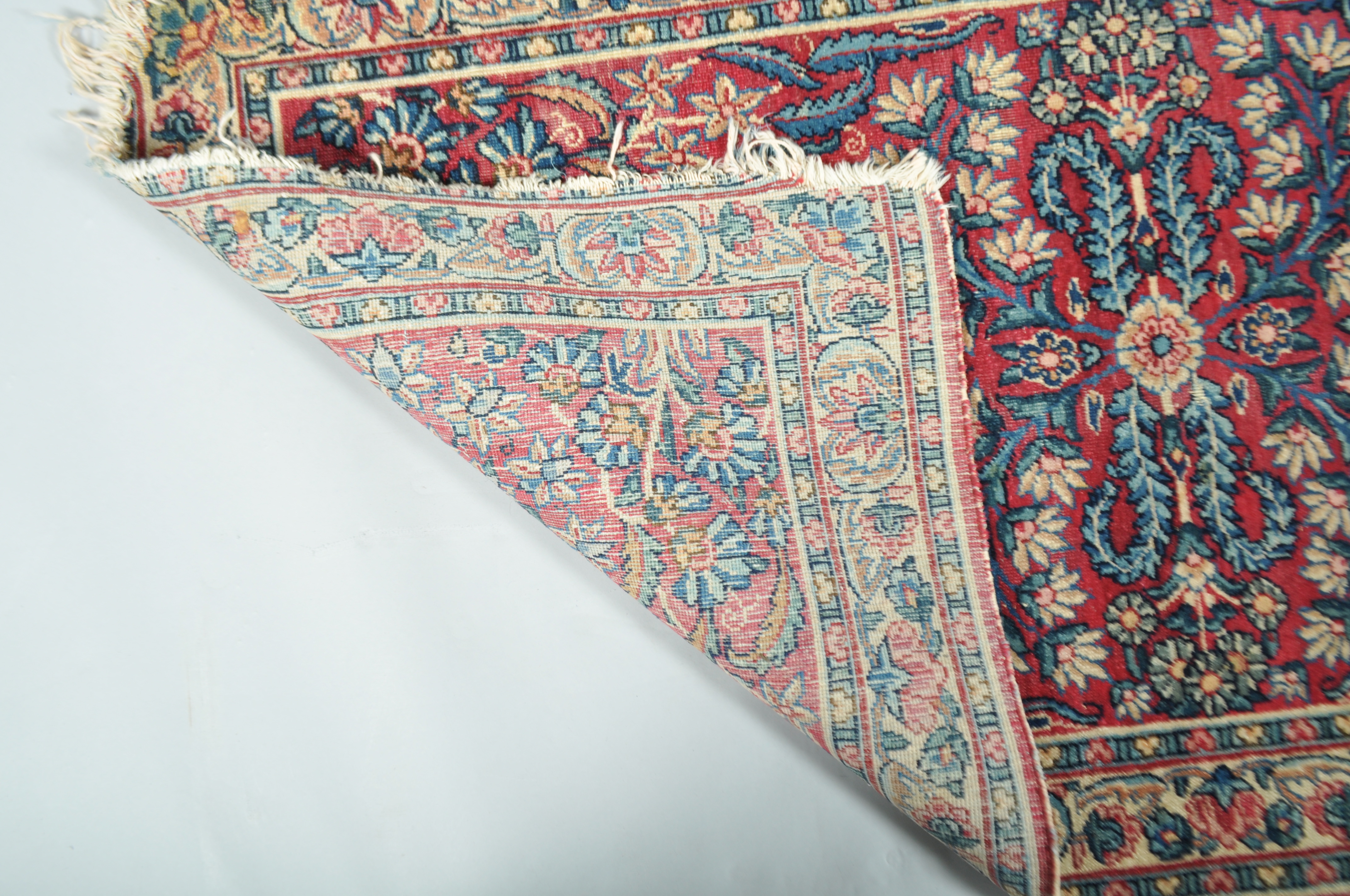 A Middle Eastern small scale carpet claret centre ground, - Image 3 of 3