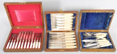 Three cased cutlery sets comprising, a set of six electroplated engraved knives and forks,