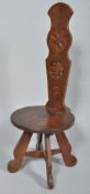 An Arts & Crafts oak spinning chair,