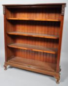 A mahogany bookcase of rectangular form with three adjustable shelves,