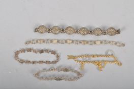 A white metal filigree bracelet, stamped 925,