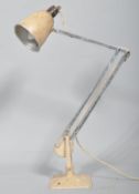 A Hadrill & Horstmann Ltd vintage mid-20th century anglepoise lamp, in cream and chrome,