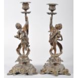 A pair of Victorian spelter candlesticks,