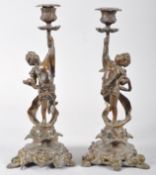 A pair of Victorian spelter candlesticks,