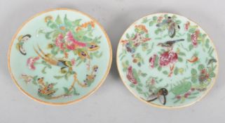 Two 19th century Chinese Celadon ground Famille Rose decorated saucers,