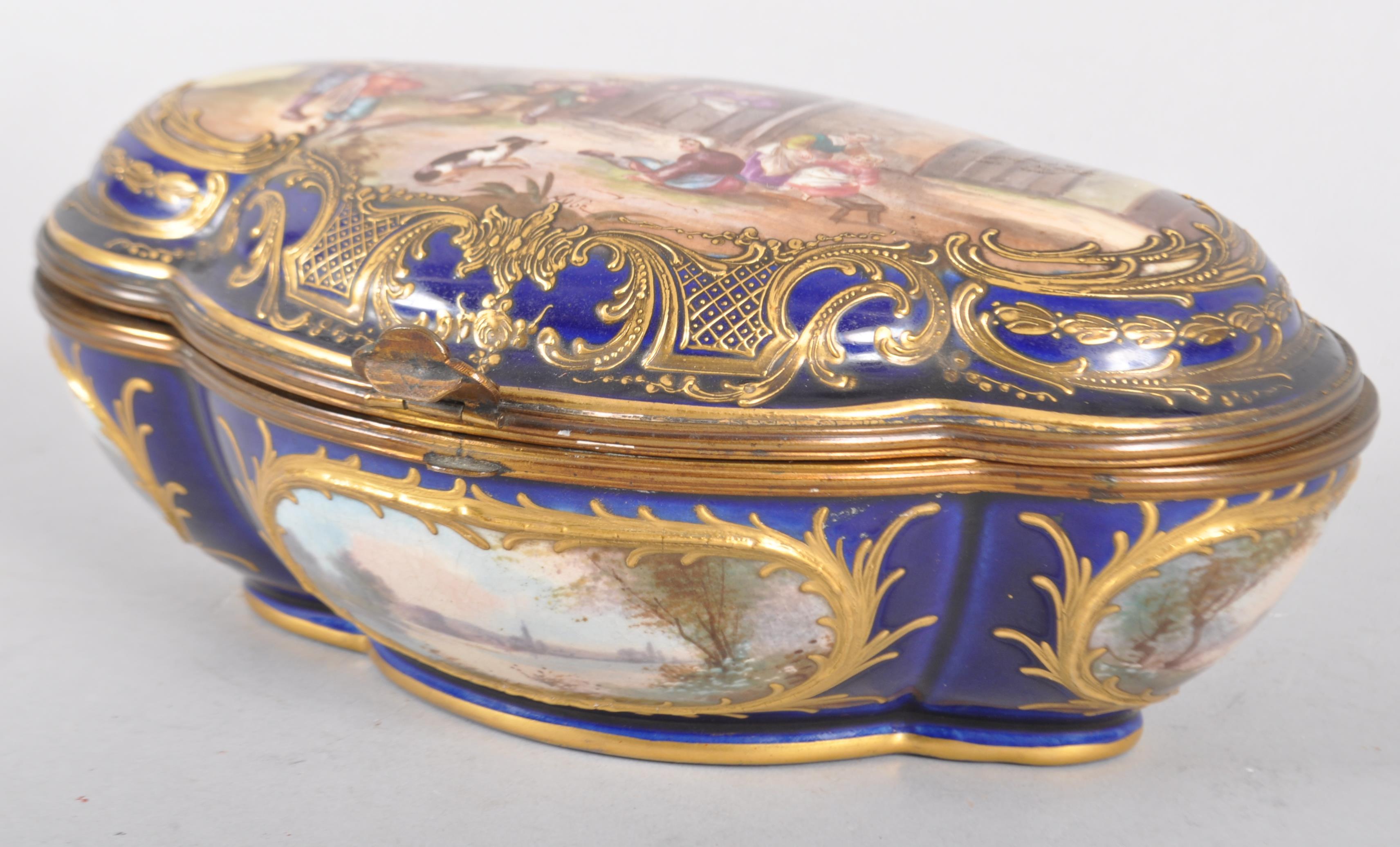 A Sevres style quatrefoil gilt metal mounted box and cover, early 20th century,