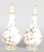 A pair of Royal Crown Derby bottle shaped vases and spire finials, late 19th century,