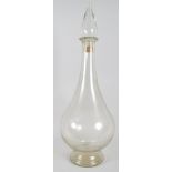 A large glass apothecary bottle an stopper, circa 1900, of baluster form, with spire stopper,