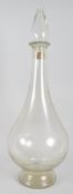 A large glass apothecary bottle an stopper, circa 1900, of baluster form, with spire stopper,