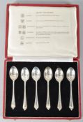 A cased set of six silver teaspoons representing the six halls of the United Kingdom 1959