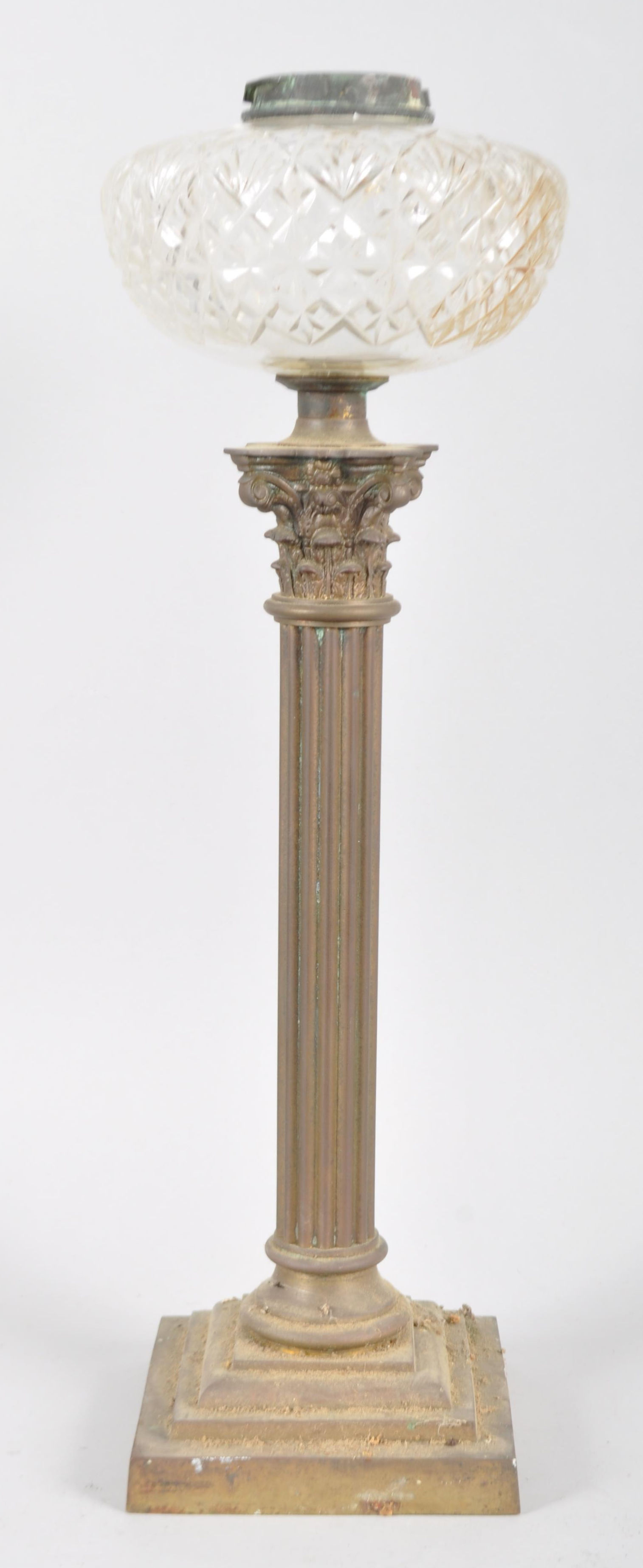 An Edwardian column lamp, with gilt metal Corinthian column base issuing cut glass shade,