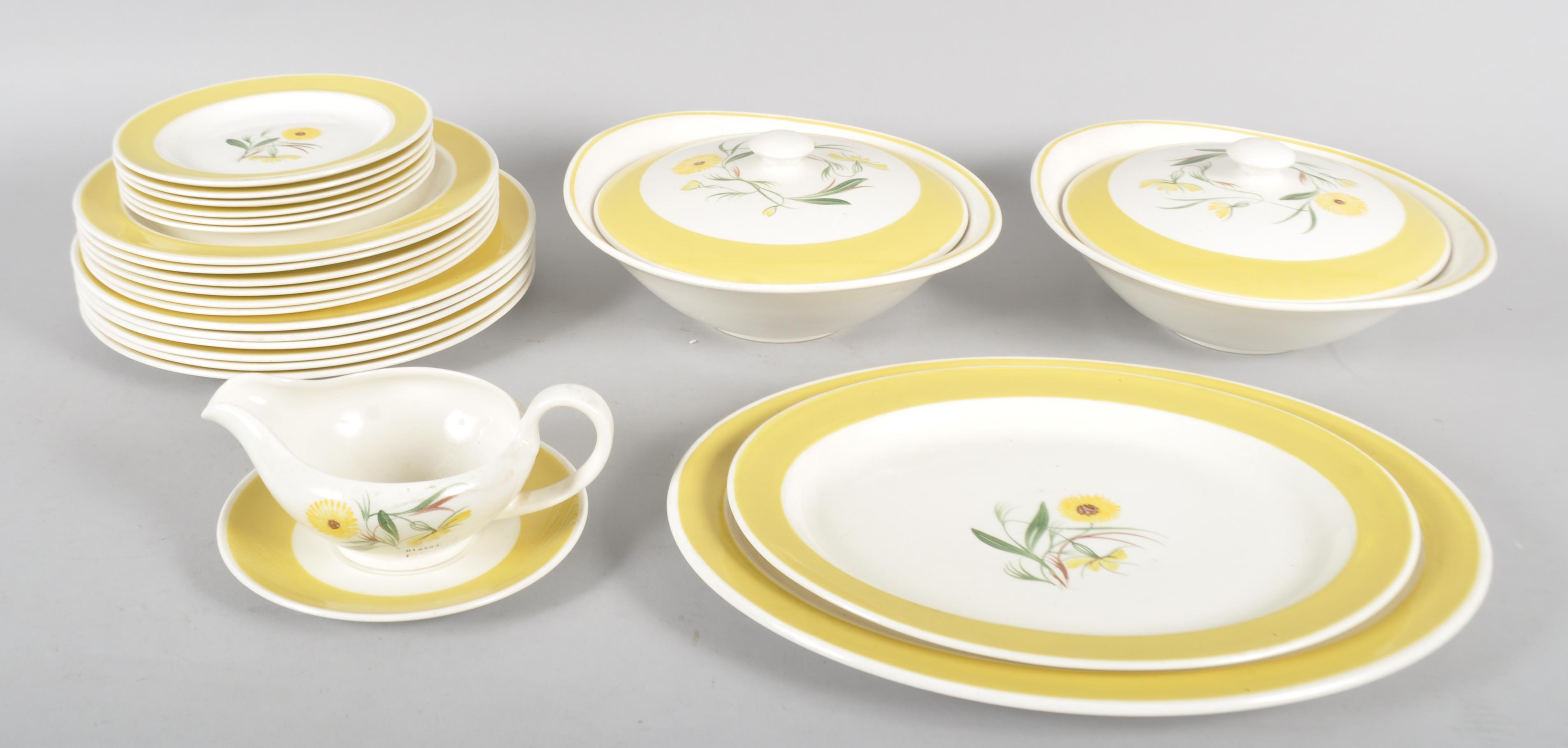 A Susie Cooper 'Marigold' pattern dinner service, circa 1920-30, printed green marks,