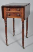 A late Victorian mahogany pembroke table,