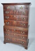 A George III mahogany chest on chest, the upper section with two short over three long drawers,