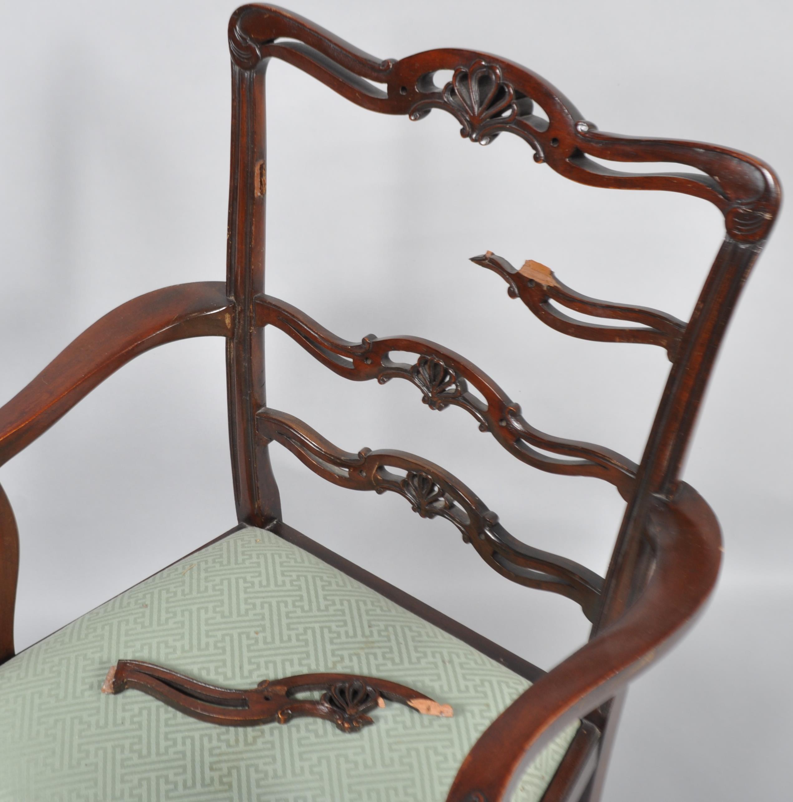 Five George III mahogany dining chairs and an armchair, with pierced scroll splats with palmettes, - Image 4 of 4