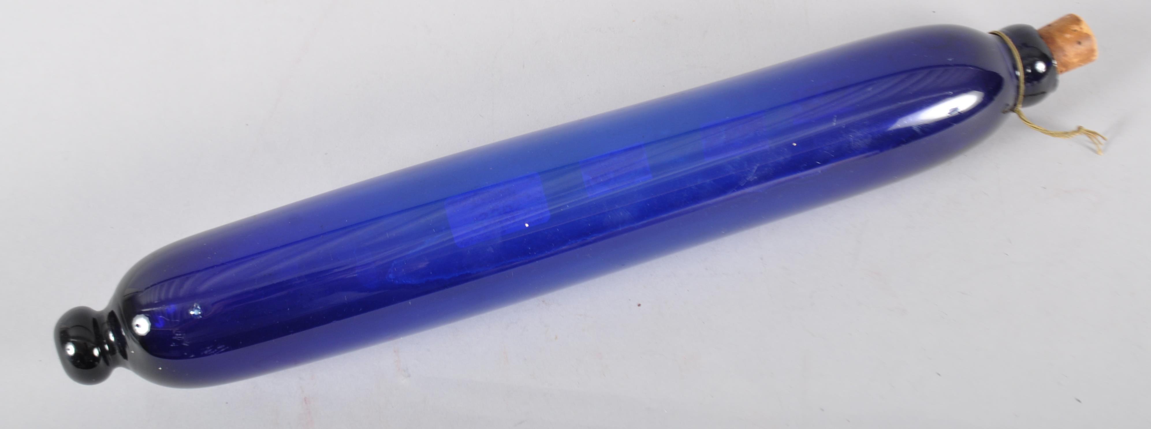 A 19th century Bristol Blue glass rolling pin,