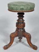 A mahogany adjustable piano stool, late 19th century,