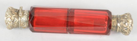 A Victorian gilt metal mounted cut ruby glass vinaigrette,