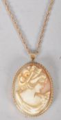 A 9ct gold cameo pendant, carved in relief with a lady, the mount stamped Birmingham 1975,