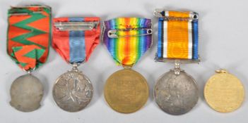 A collection of medals, comprising : A First World War British War Medal,