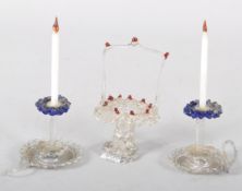 A pair of miniature lampwork glass candlesticks and a basket, of Nevres-type,