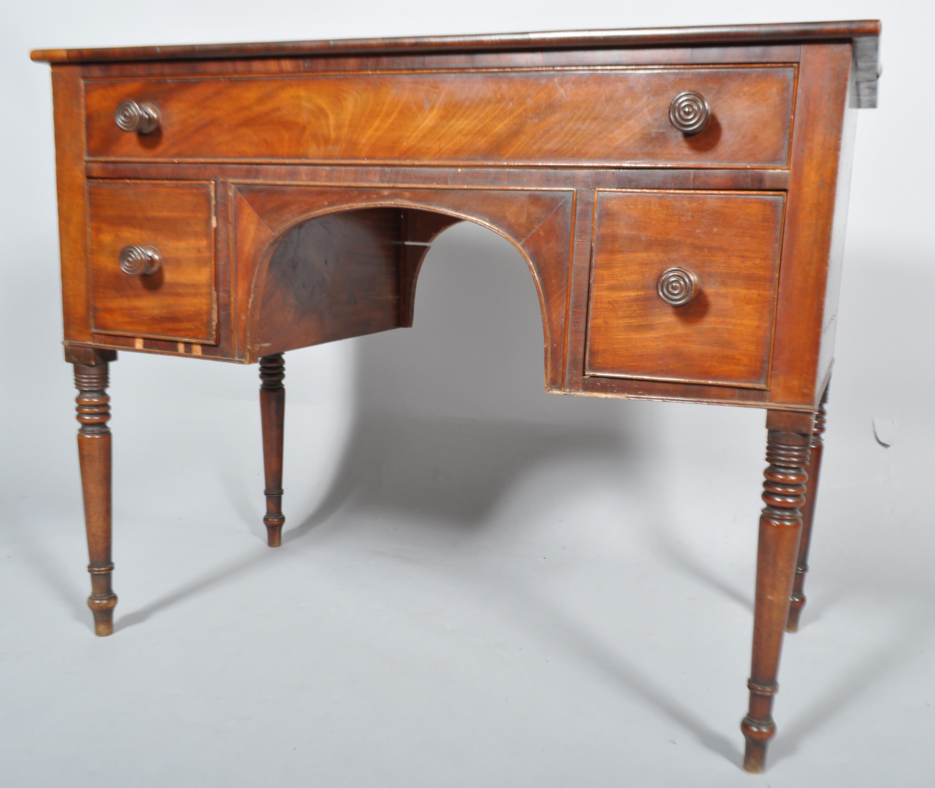 A Victorian mahogany kneehole desk, early 19th century,