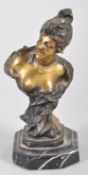 An Art Nouveau style gilt bronze sculpture of a lady, signed Riguoz (?) to the reverse,