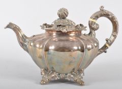 A Victorian silver melon form teapot, the domed lid set with a melon and leaf knop,